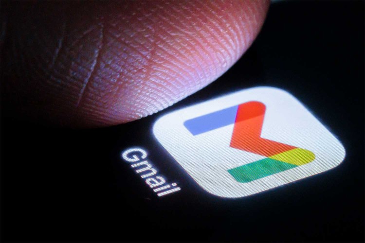 In this photo illustration the gmail app can be seen on a smartphone next to a finger on March 27, 2024 in Berlin, Germany