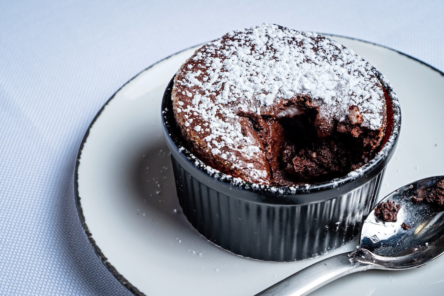 souffle with powdered sugar and spoon