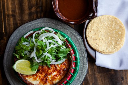 tortillas, dish with cilantro, lime, onionsn