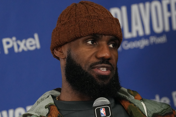 LeBron James talks to the media after losing.