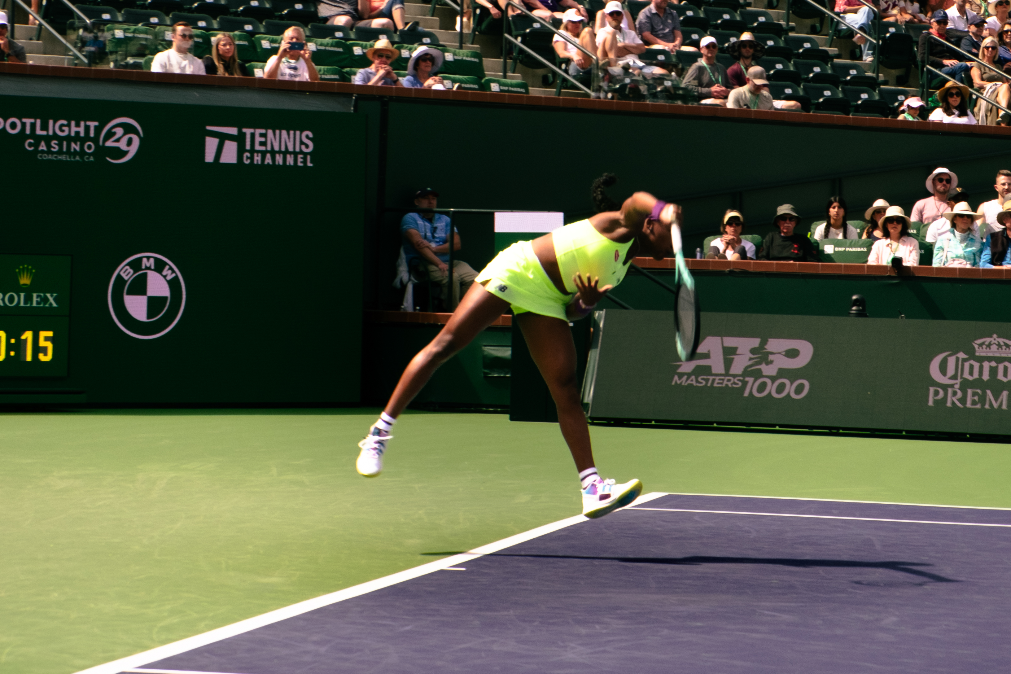 Coco Gauff strikes a serve at Indian Wells.