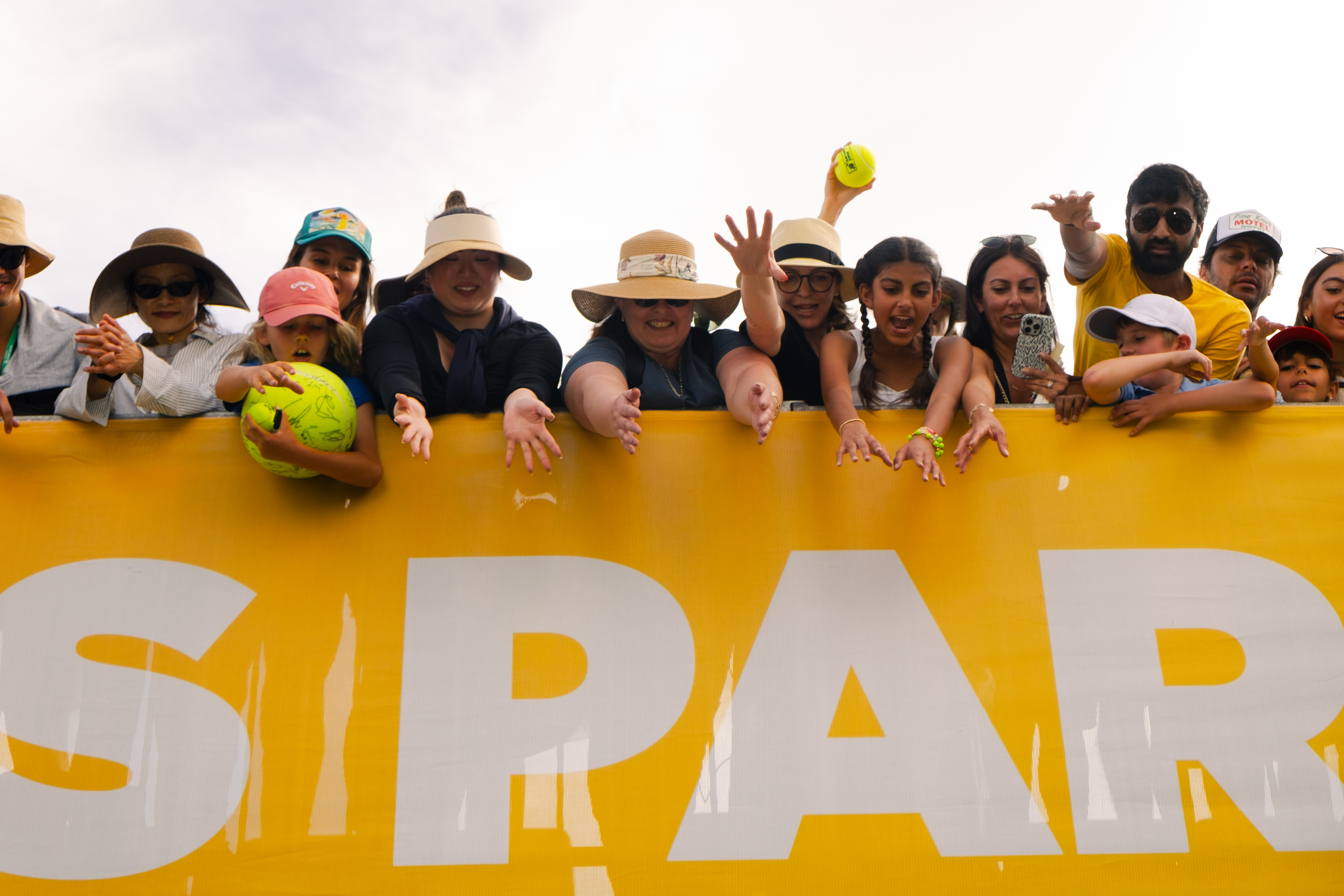 Fans reach for autographs at the Indian Wells Open.