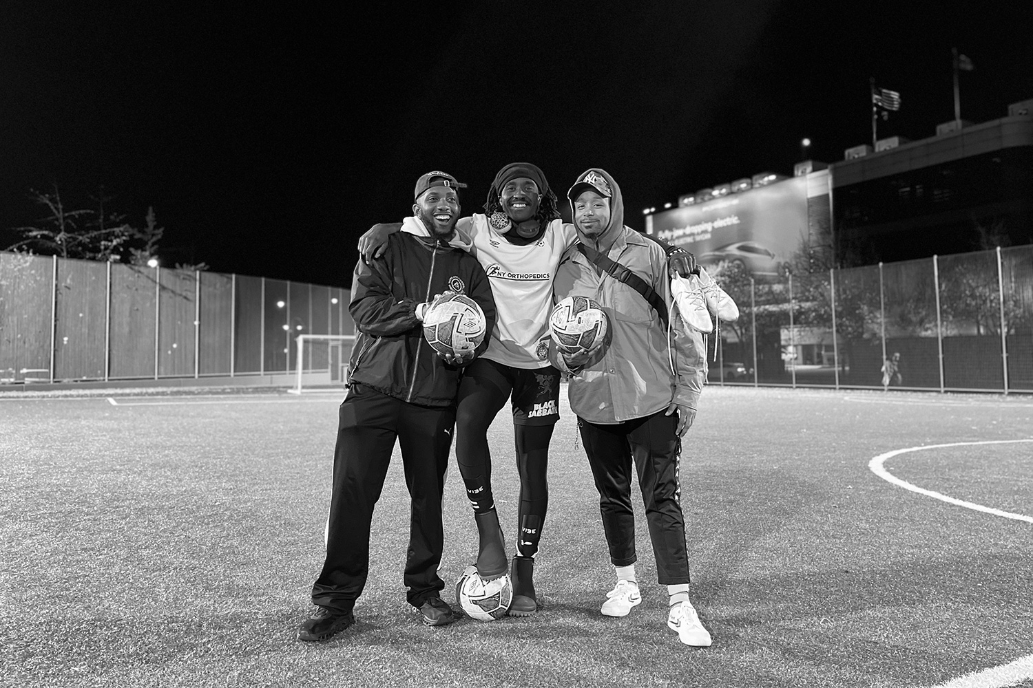 Joe Kanzangu and friends after soccer with NYC Footy