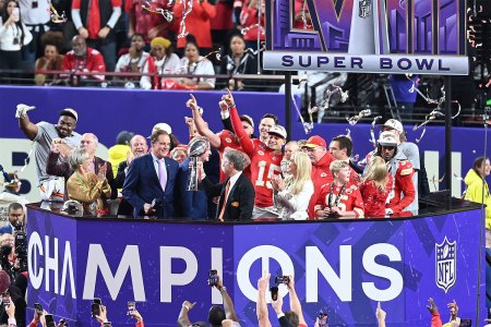 The Kansas City Chiefs celebrate with the Lombardi Trophy.