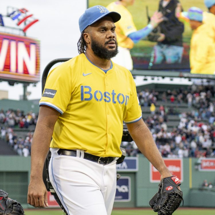 Kenley Jansen of the Boston Red Sox walks off the field after a win.