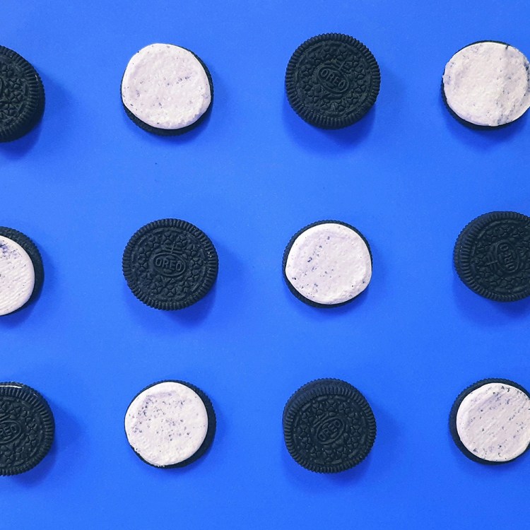 A bunch of Oreos against a blue background. We tested these snack cookies and other junk foods to see which ones are best as pre-workout fuel.