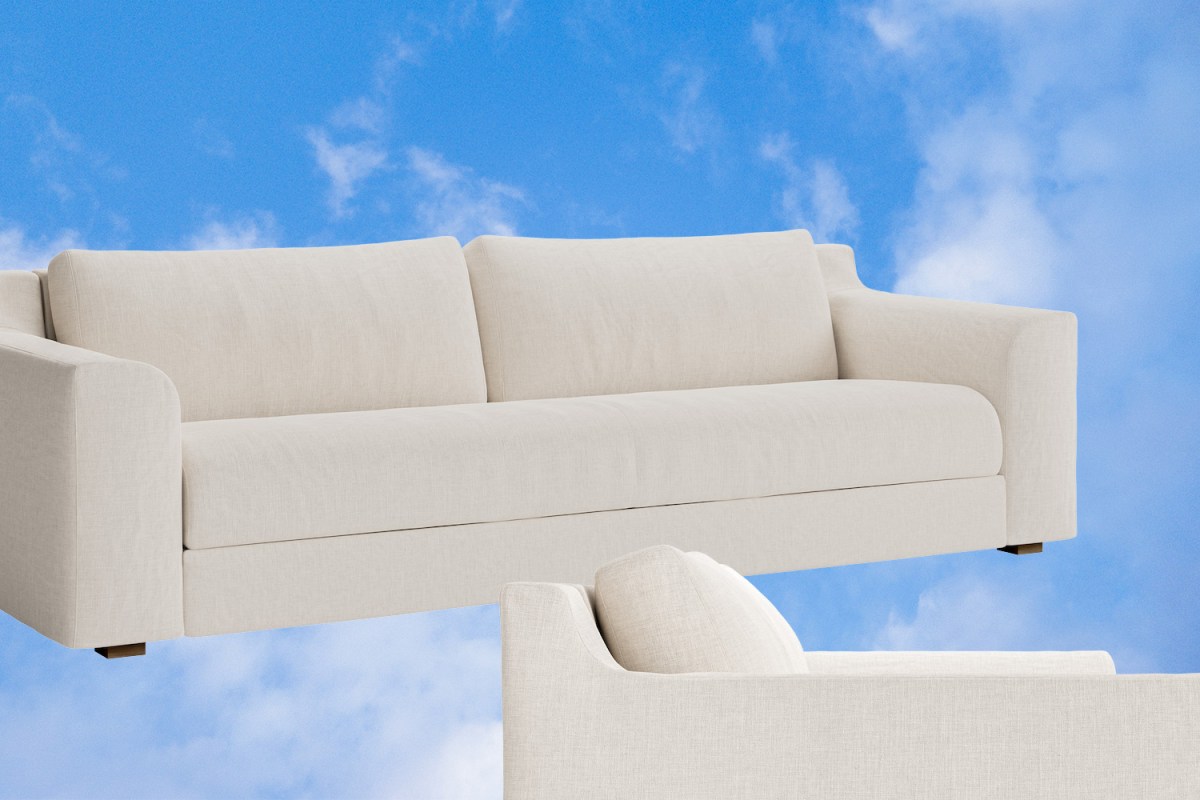 The Sabai Sleeper Sofa against a background of blue sky and clouds.