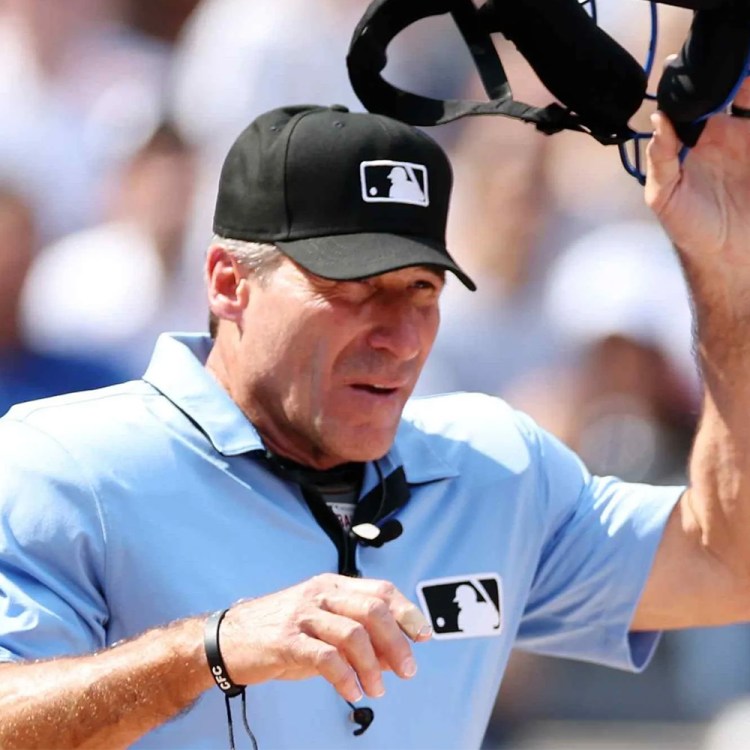 MLB umpire Angel Hernandez making a call. The controversial baseball ump retired this week at the age of 62.
