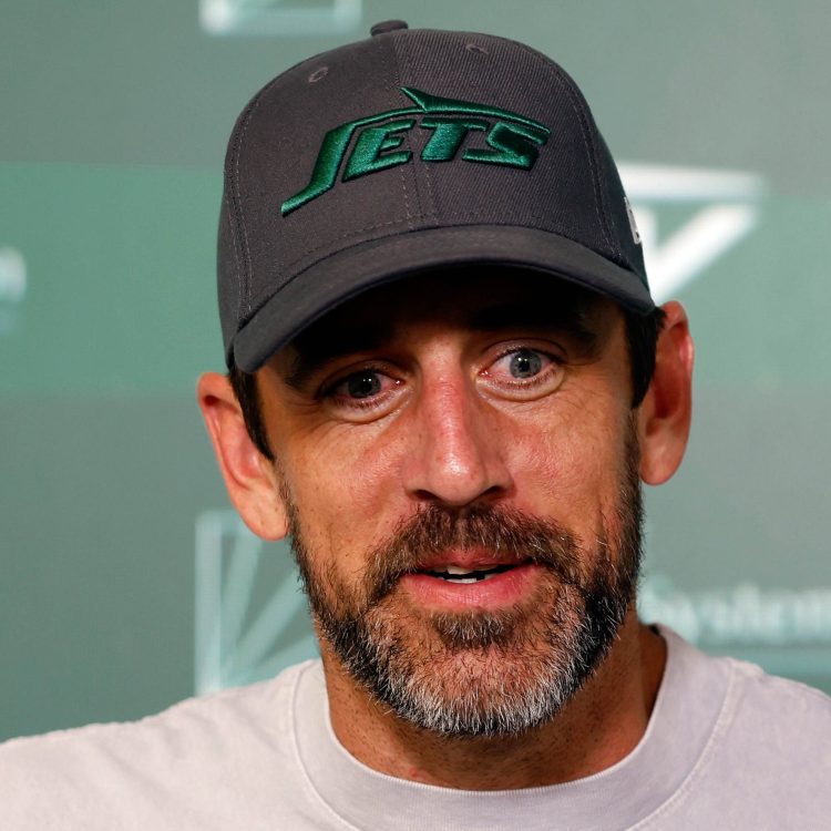 Aaron Rodgers speaks to the media at Jets' OTAs.