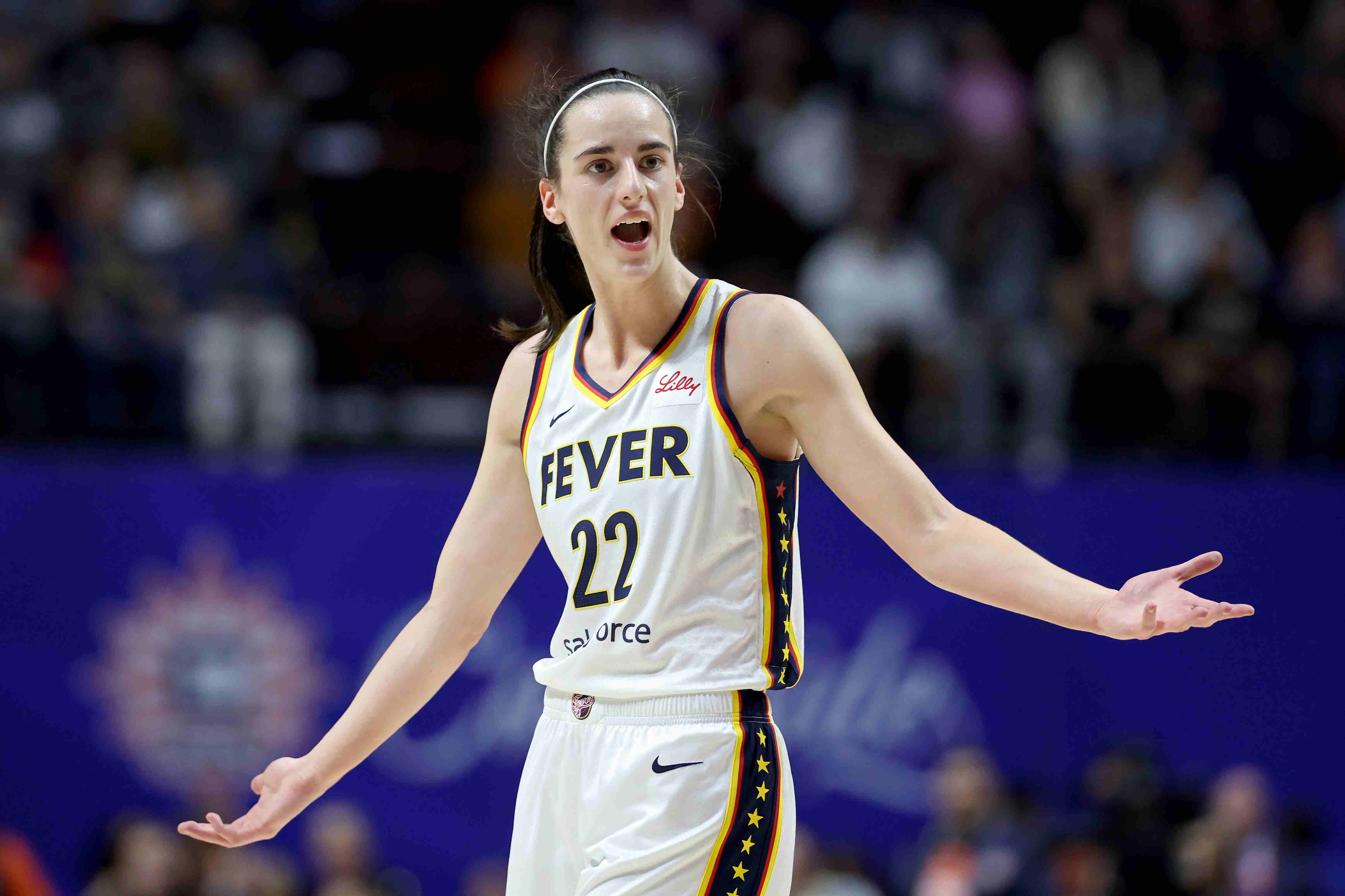 Caitlin Clark of the Fever reacts after being called for a foul.