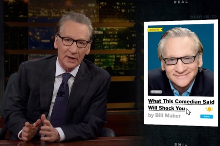 Bill Maher with his book