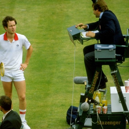 John McEnroe complaining to an official.