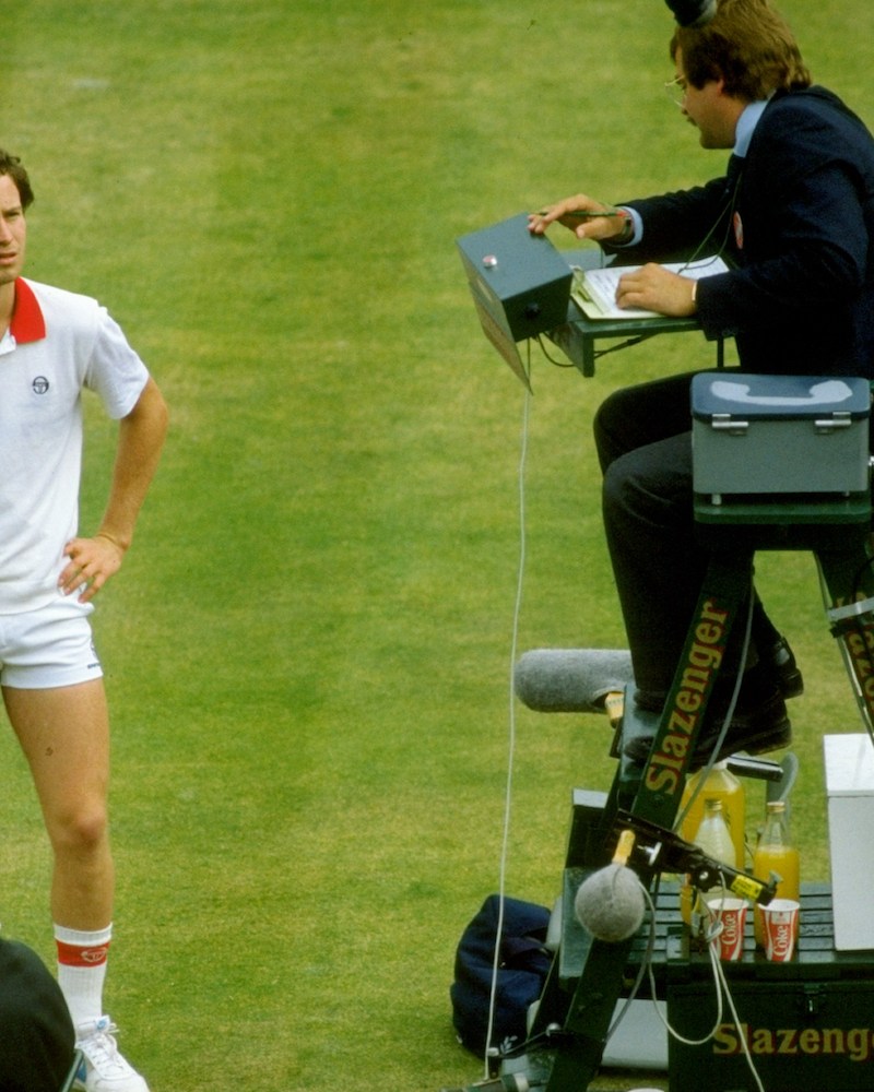 John McEnroe complaining to an official.
