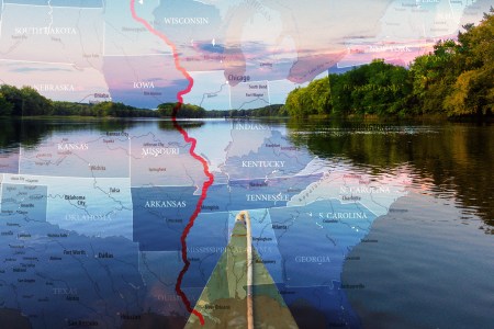 A canoe facing down the Mississippi River. If you're looking for a bucket list adventure, you should consider paddling the great river.