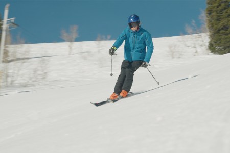 Thomas Hart, also known as "Racer Tom," skiing down Mount Ogden at Snowbasin Resort