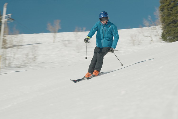 Thomas Hart, also known as "Racer Tom," skiing down Mount Ogden at Snowbasin Resort