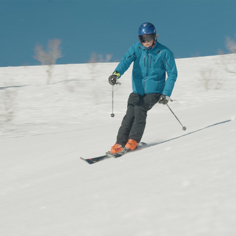 Thomas Hart, also known as "Racer Tom," skiing down Mount Ogden at Snowbasin Resort