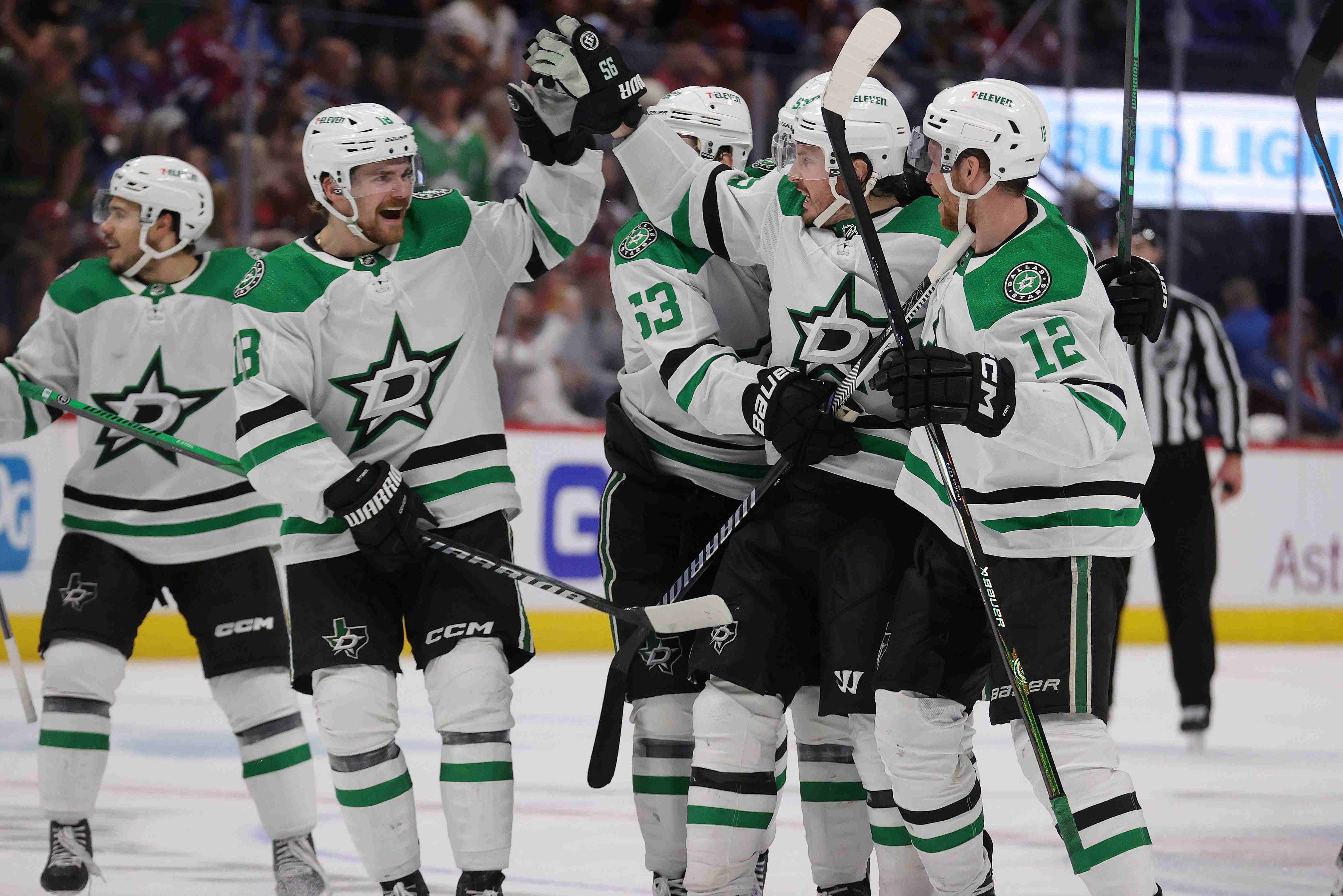 The Dallas Stars celebrate a game-winning goal.