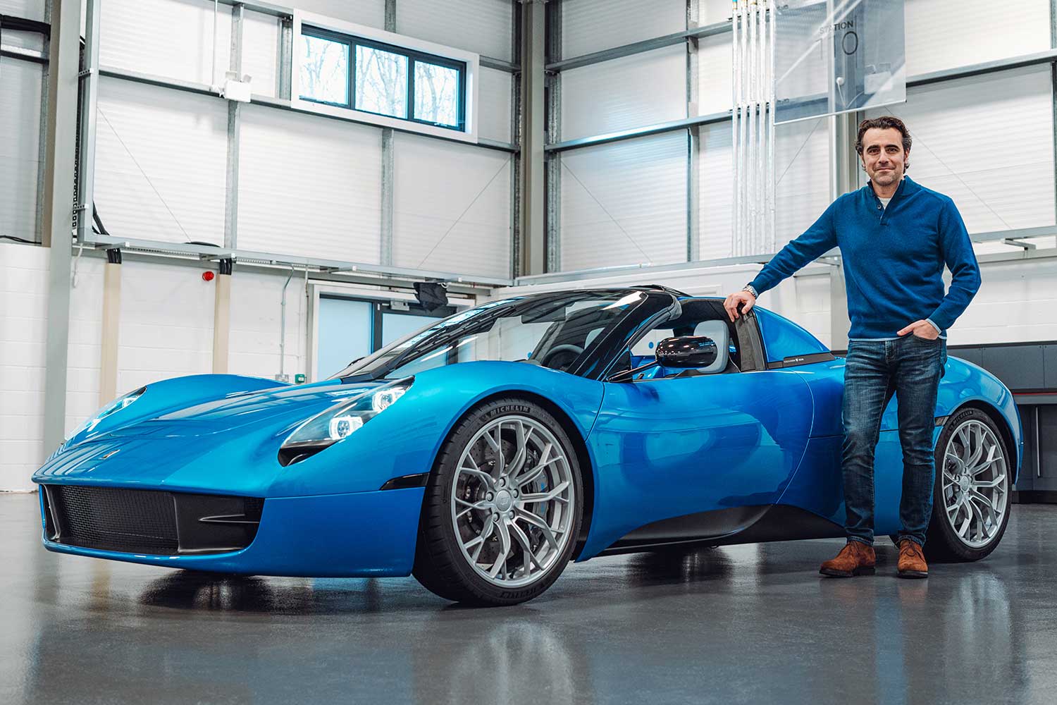 Legendary racing driver Dario Franchitti next to the T.33 Spider from Gordon Murray Automotive