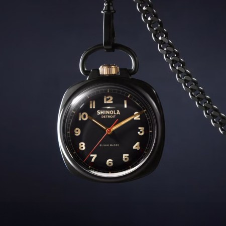 Pocket watch on dark background