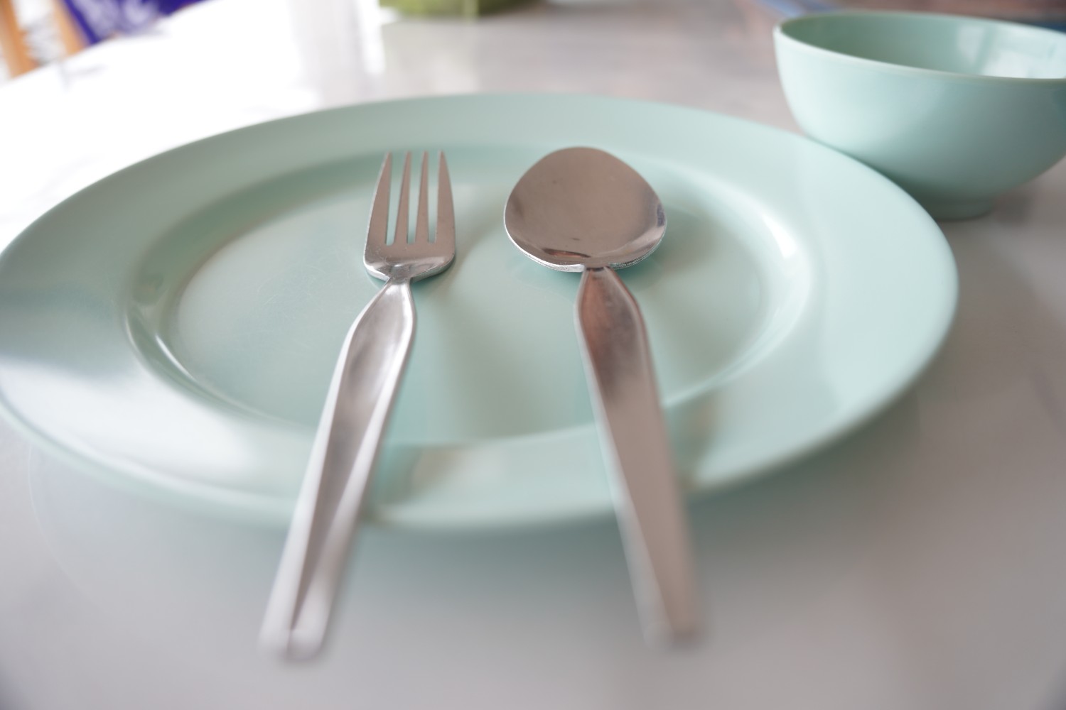 Fork and spoon on plate