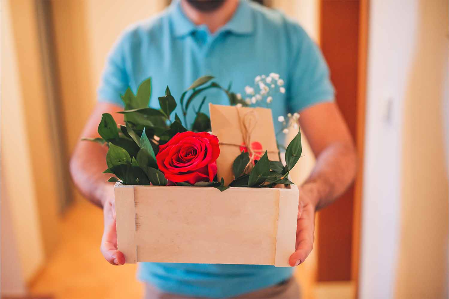 A man delivering roses