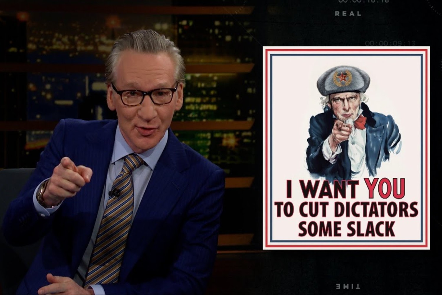 Bill Maher and a poster