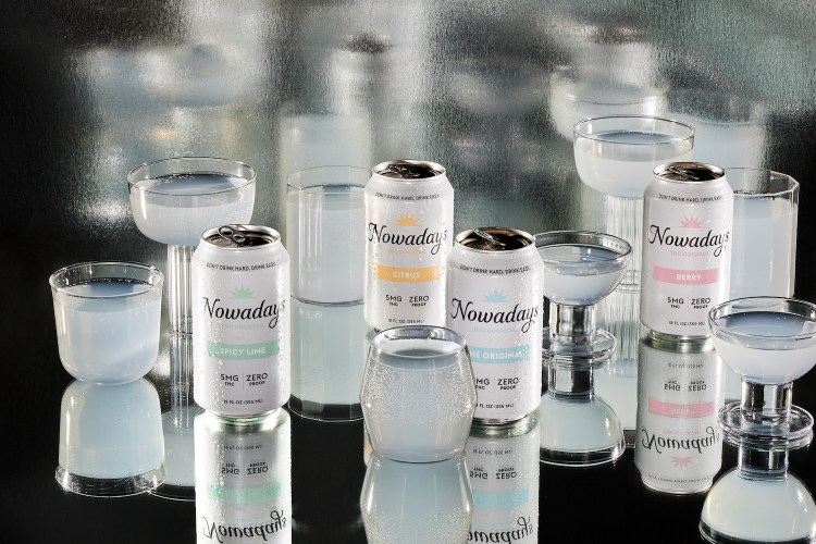 Cans and glasses of Nowadays canned THC beverage