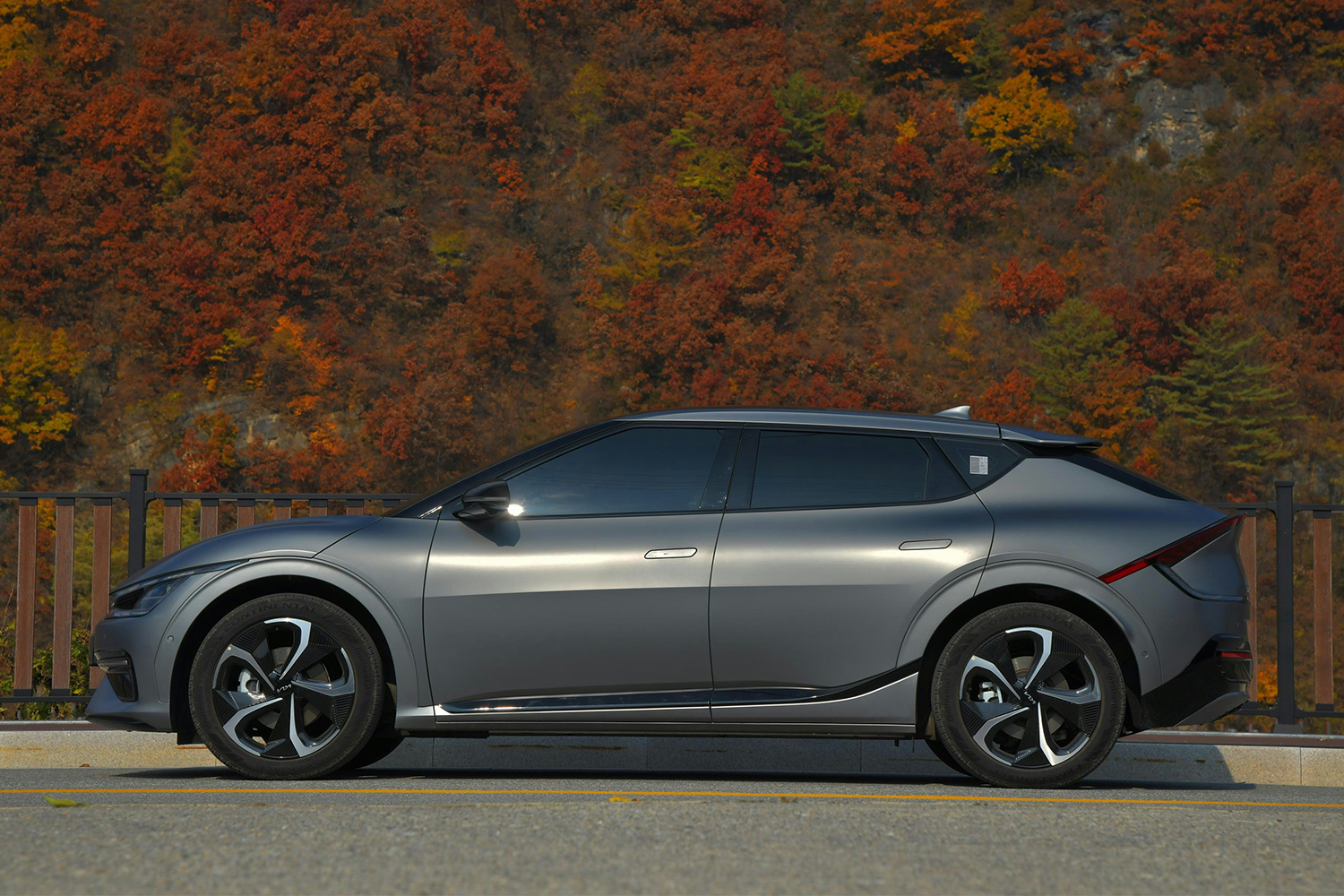A Hyundai EV sitting on the side of the road