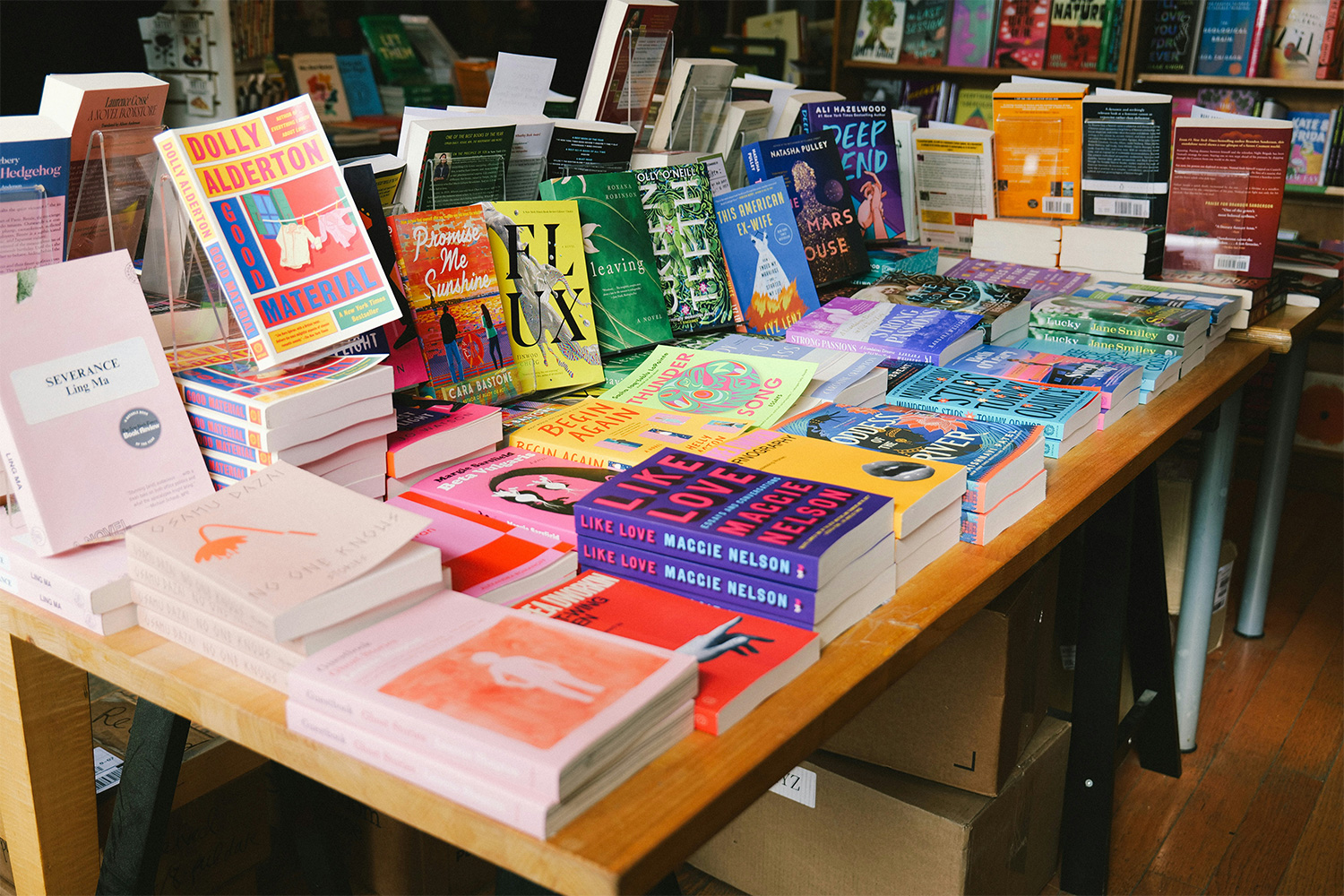 A bunch of books on a table at a local, independent bookstore in Brooklyn, New York