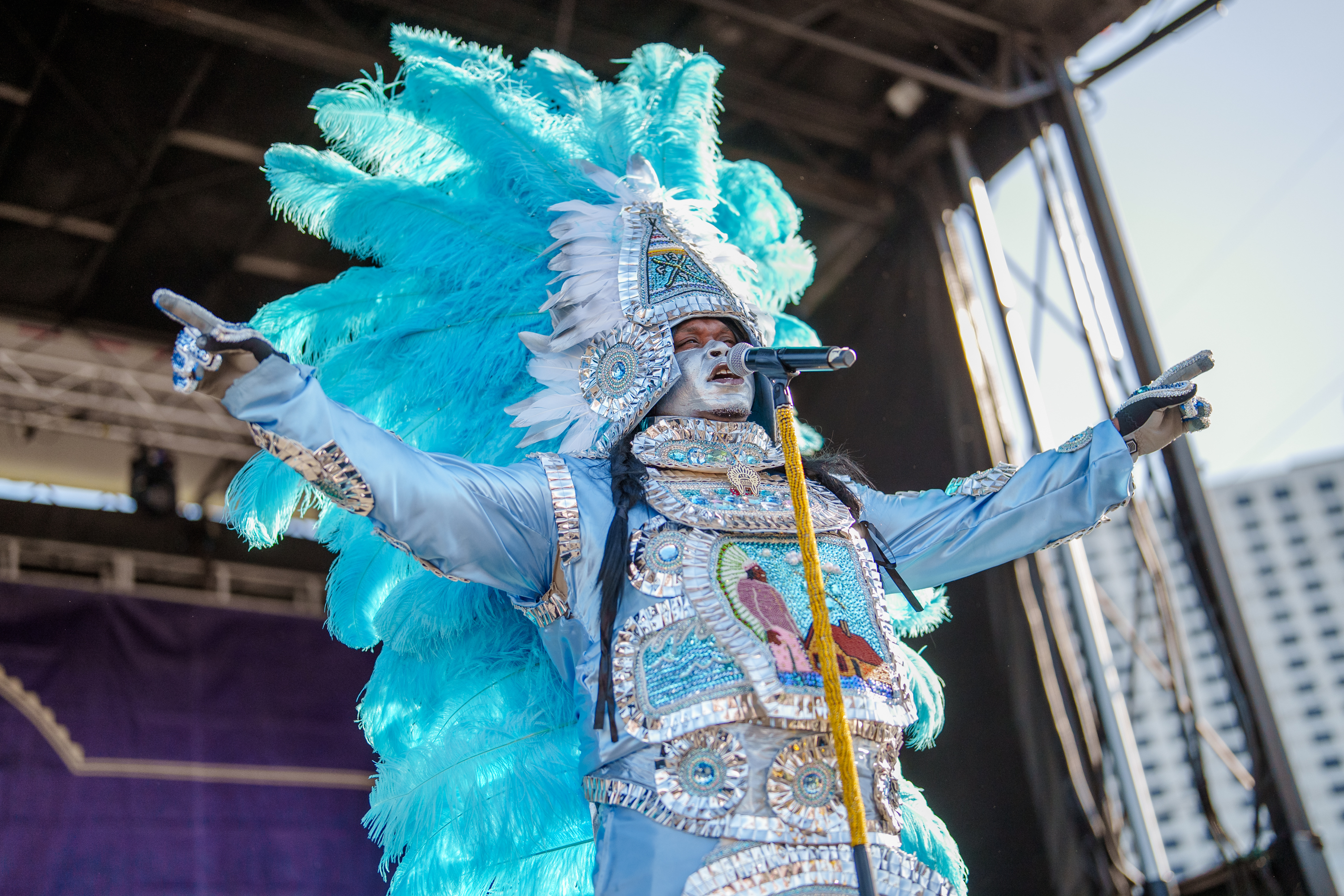 Flagboy Giz & The Wild Tchoupitoulas perform on day two of French Quarter Festival 2025.