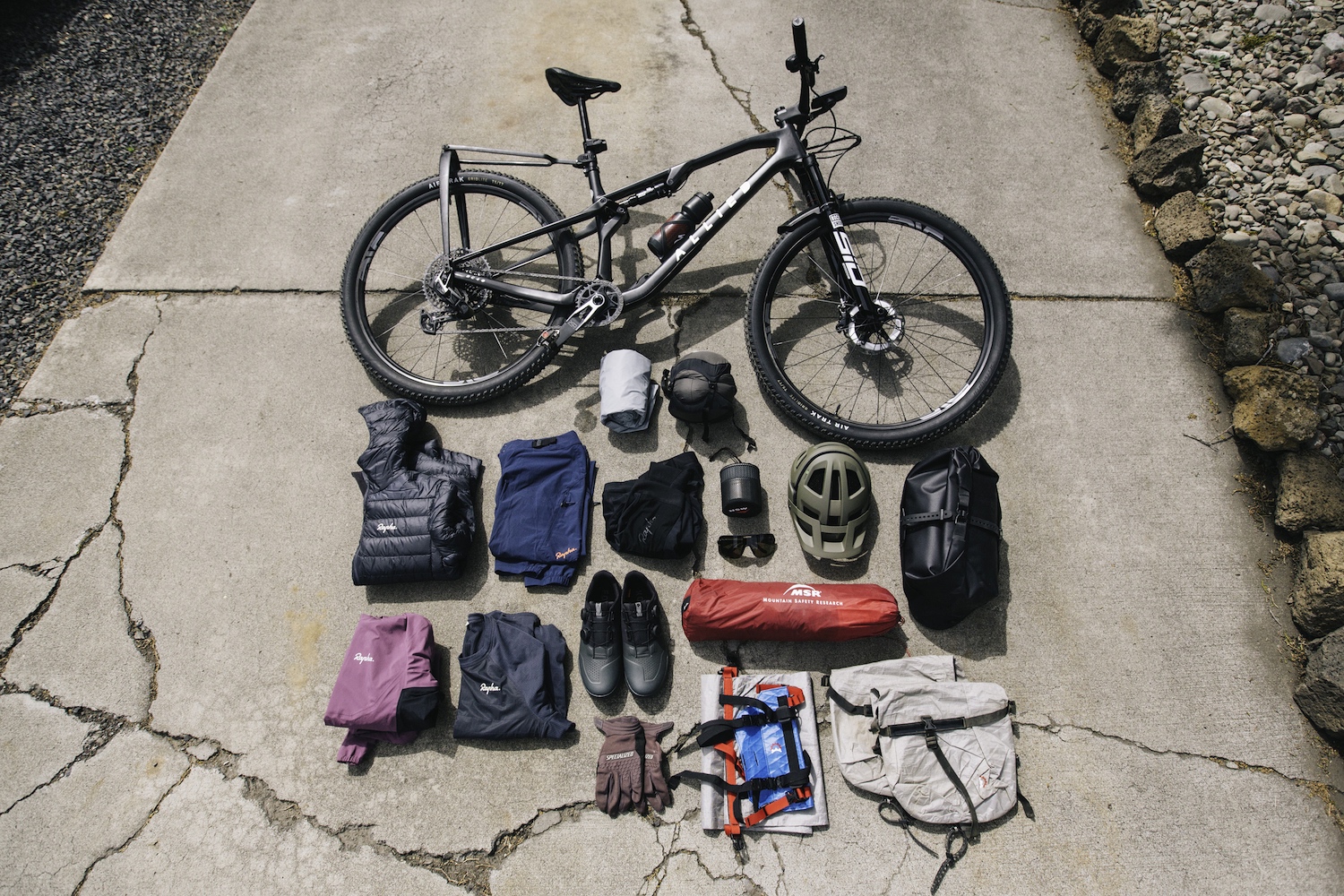 Bikepacking gear laid out for a month-long ride along the Great Divide Route