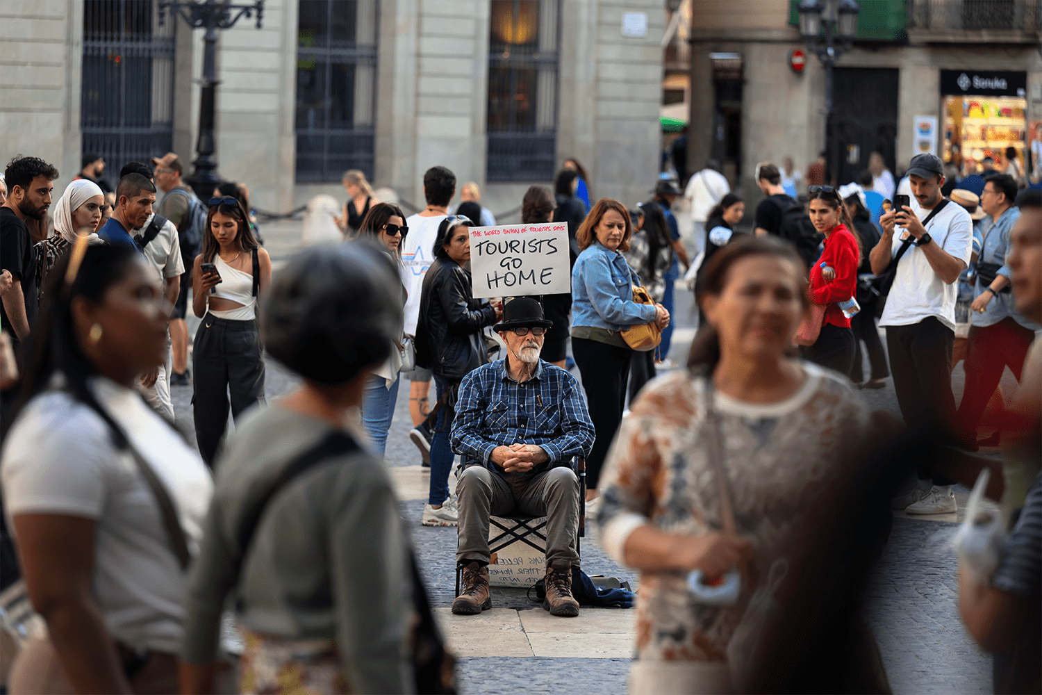 An activist in the Plaza de San Jaime in Barcelona