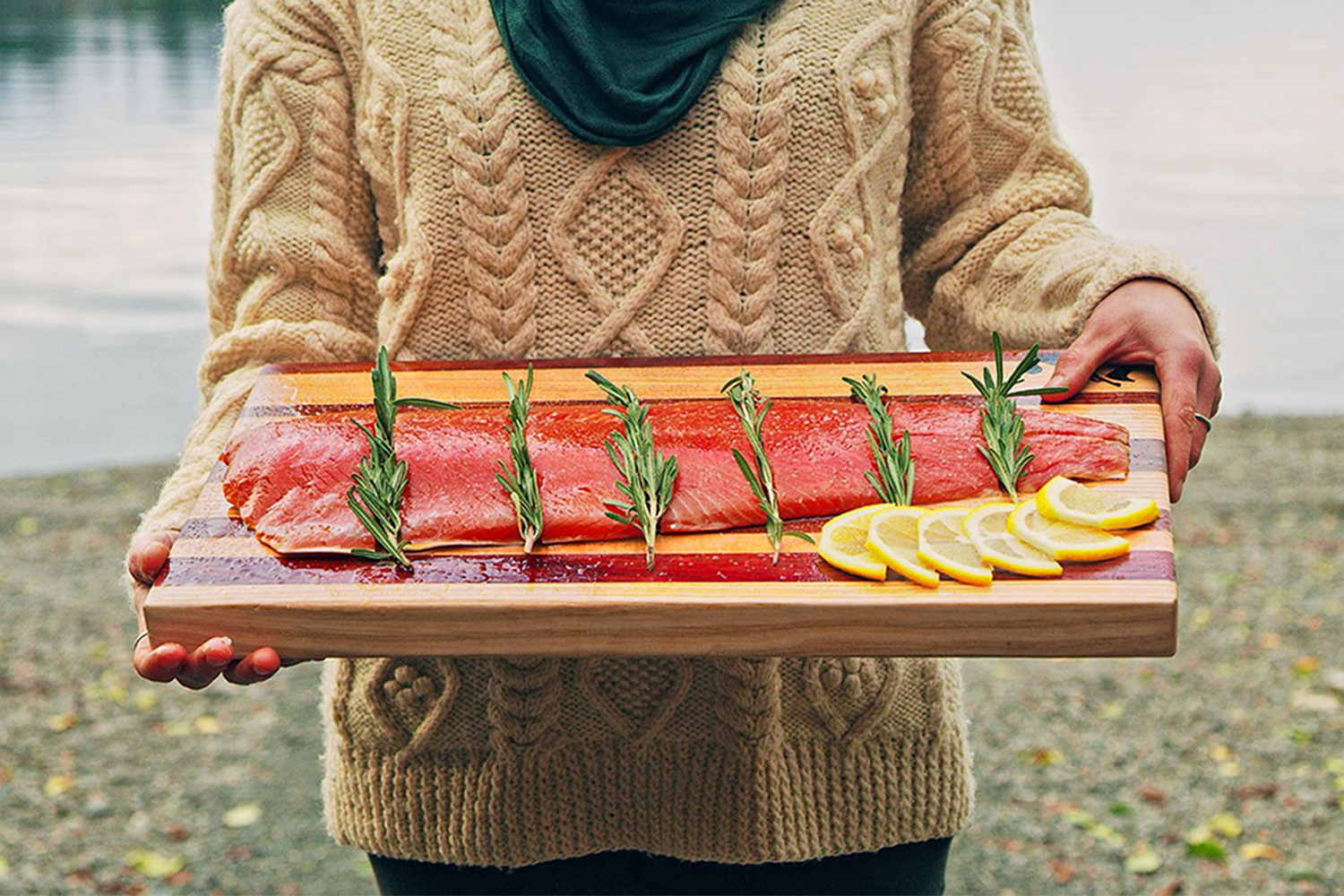 person holding prepared salmon lifestyle image