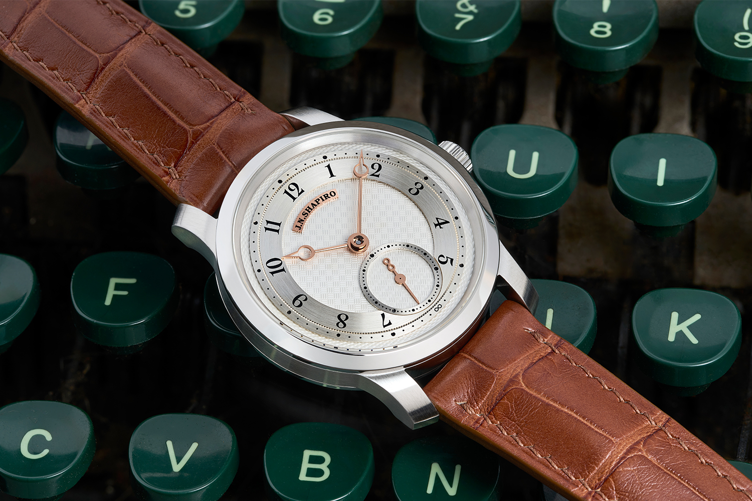 The Infinity Series Pure watch in frosted silver and rose gold from J.N. Shapiro