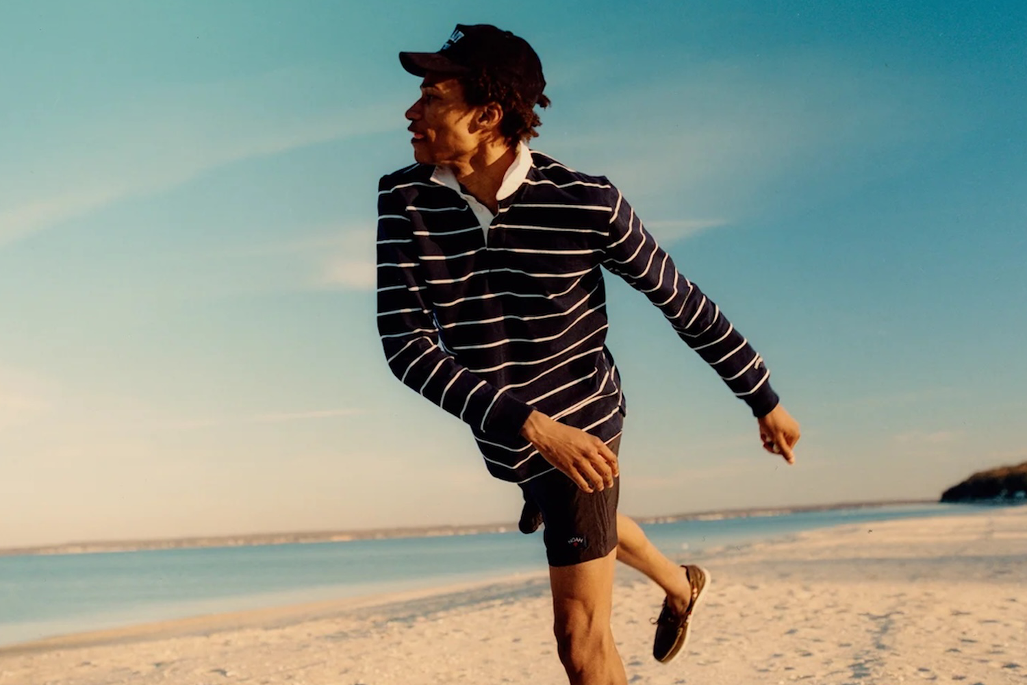 A man wearing a rugby shirt from menswear brand Noah