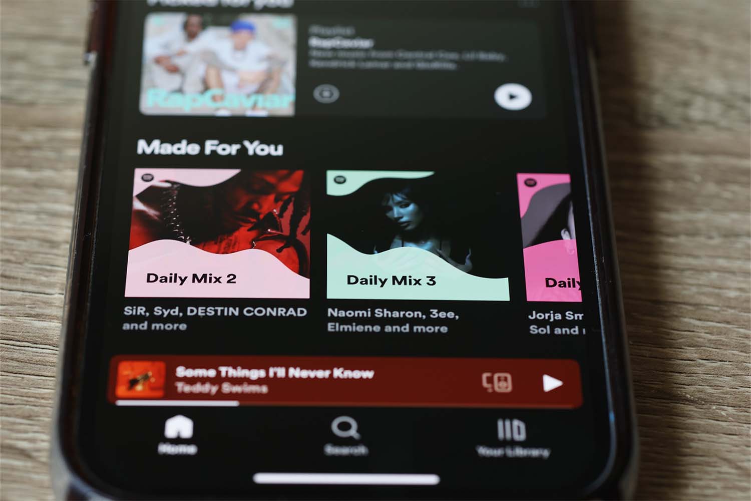 A close-up of Spotify playlists