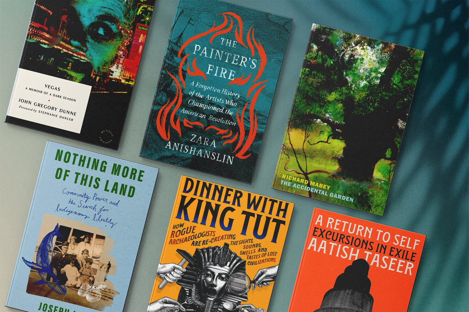 Several book colors against a tropical background