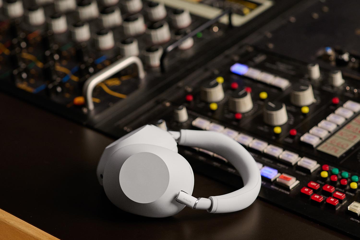Sony's WH-XM1000XM headphones on a studio console