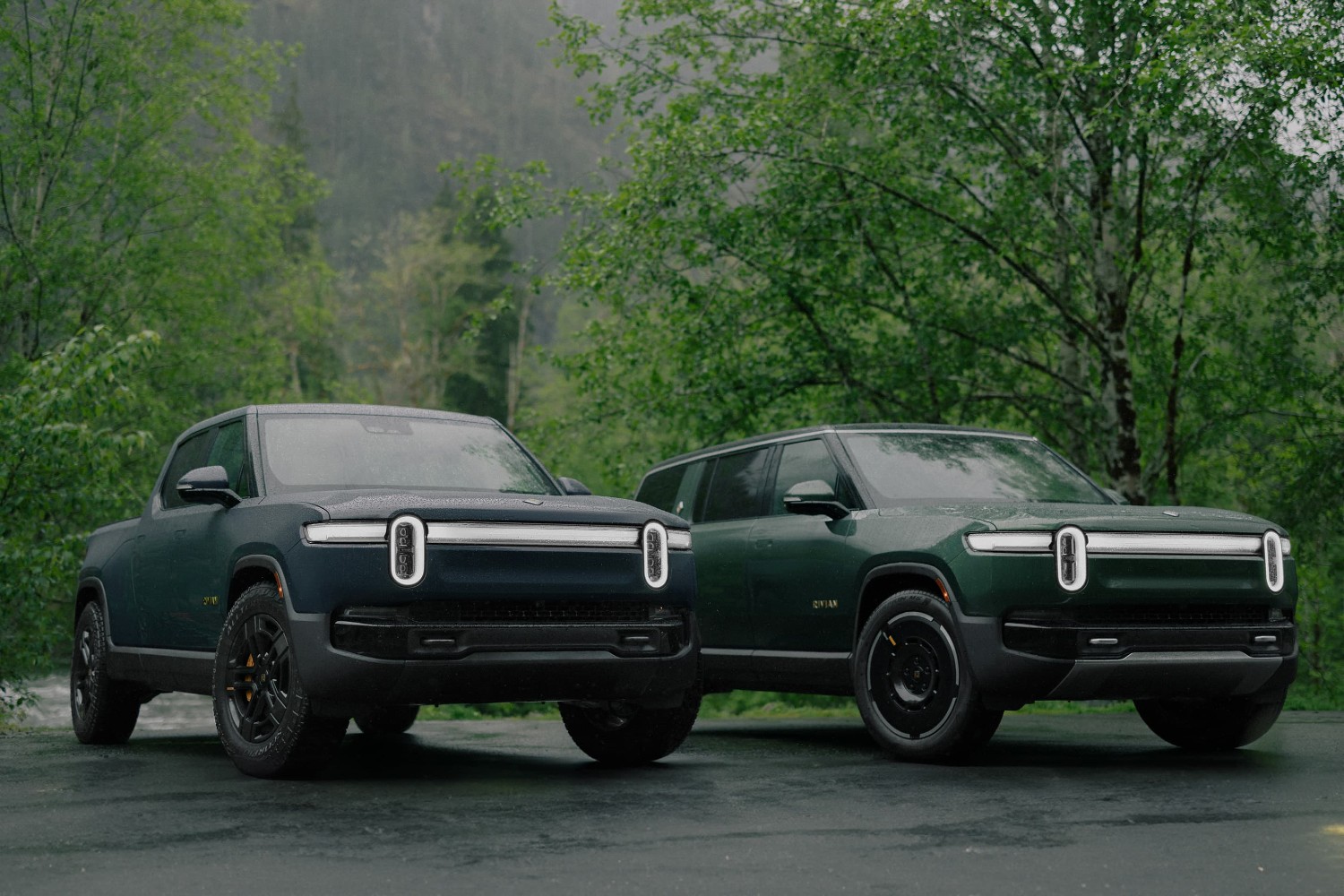 Two Rivian trucks