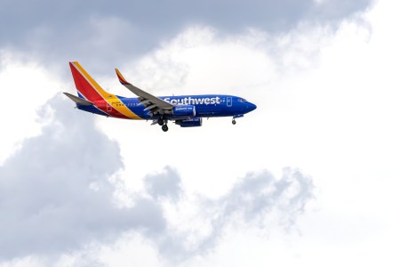Southwest Airlines flight against a cloudy sky