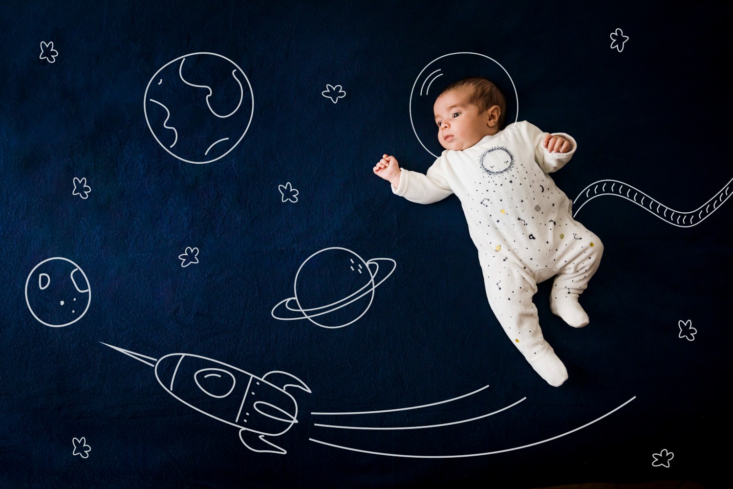 A baby in an illustration of space