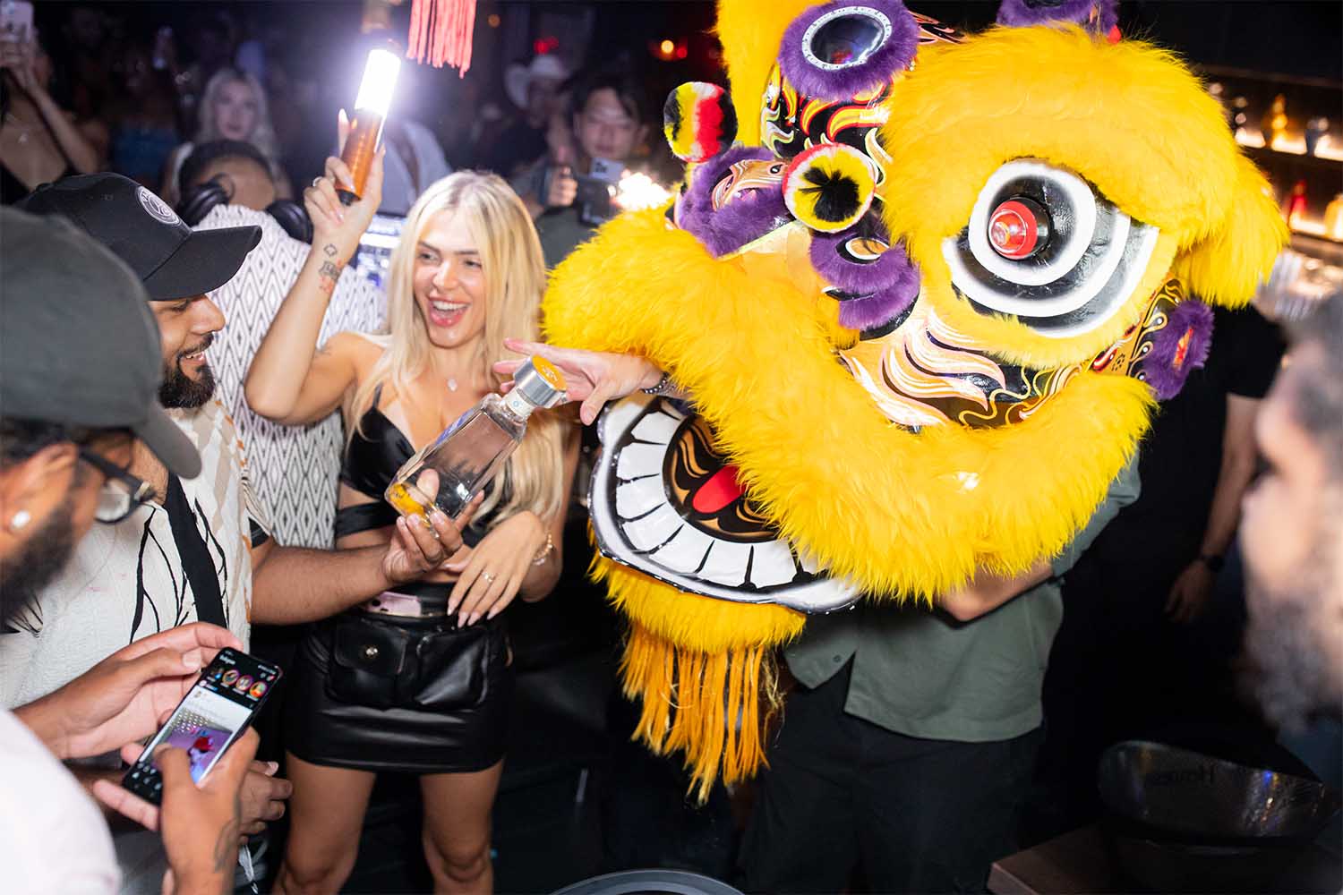 After ordering bottle service at Hong Shing, your bottle will be brought out by lion dancers