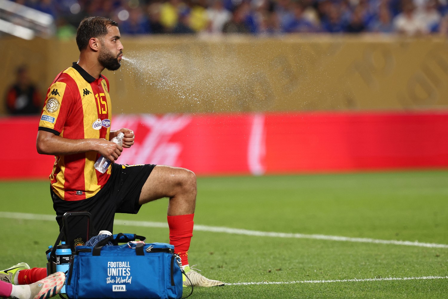 Mohamed Amine Tougai spitting during a game