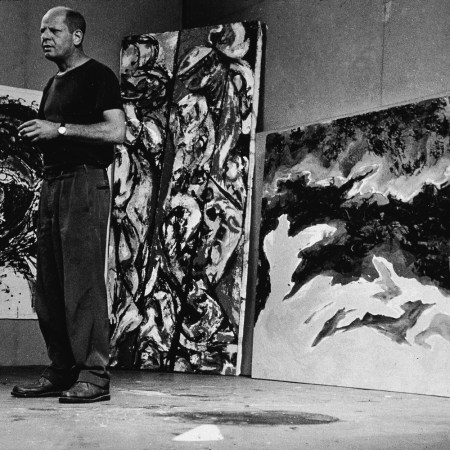 Jackson Pollock with paintings