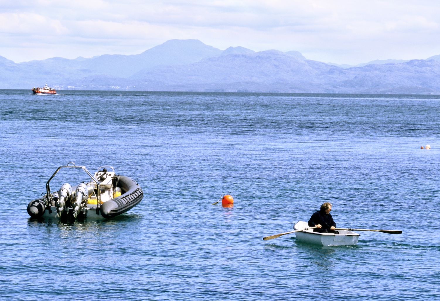 A man rowing off the coast of Scotland.
