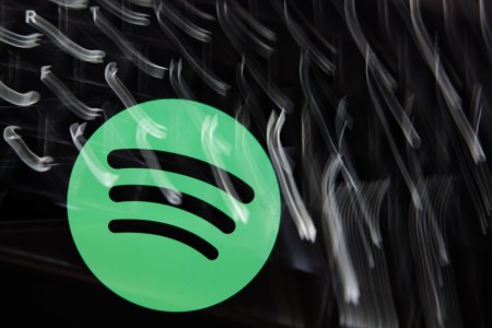 Spotify logo with light streaks
