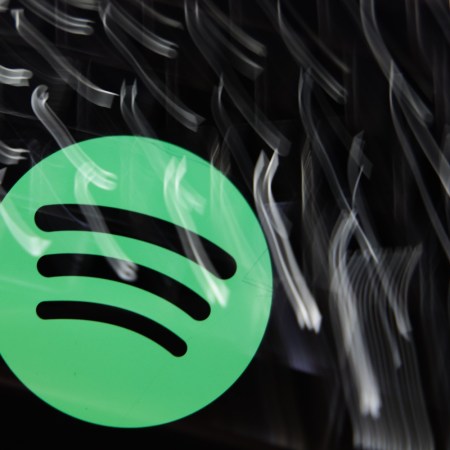 Spotify logo with light streaks