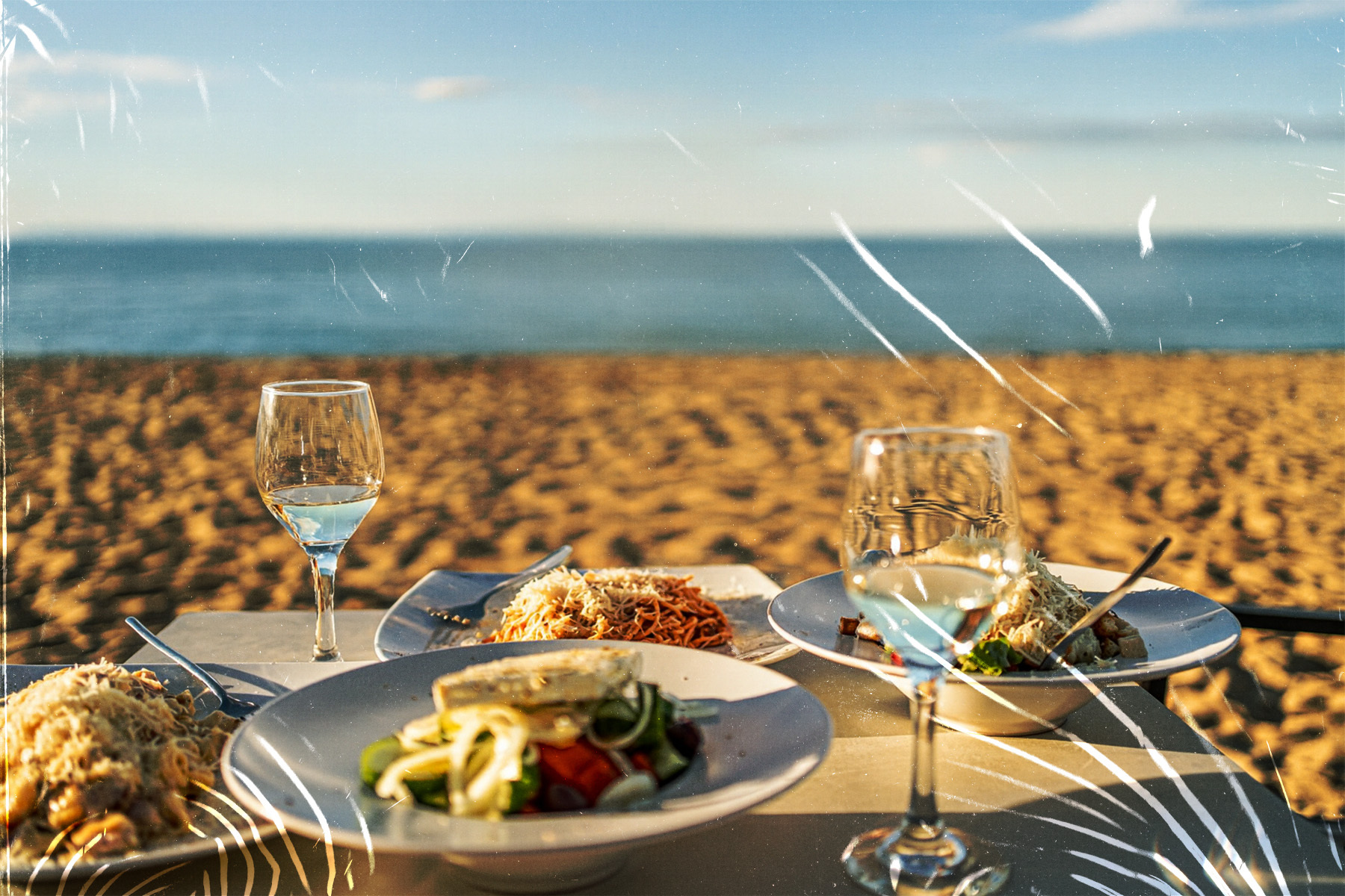 food and wine on the beach