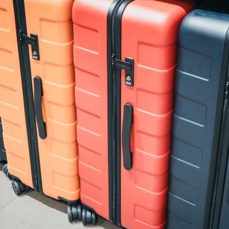 Similar luggage in a row